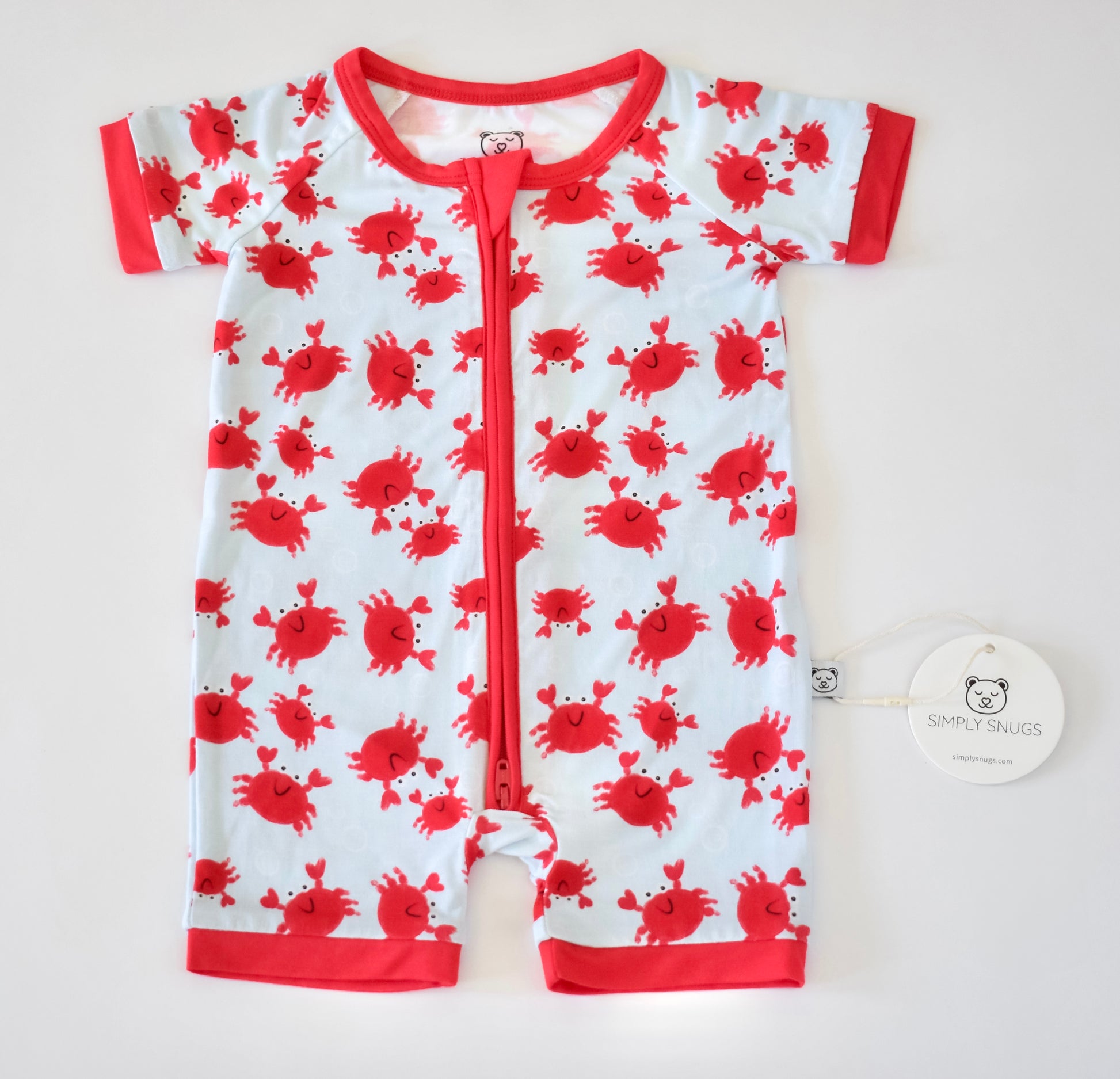 Baby summer pajama with red crab pattern