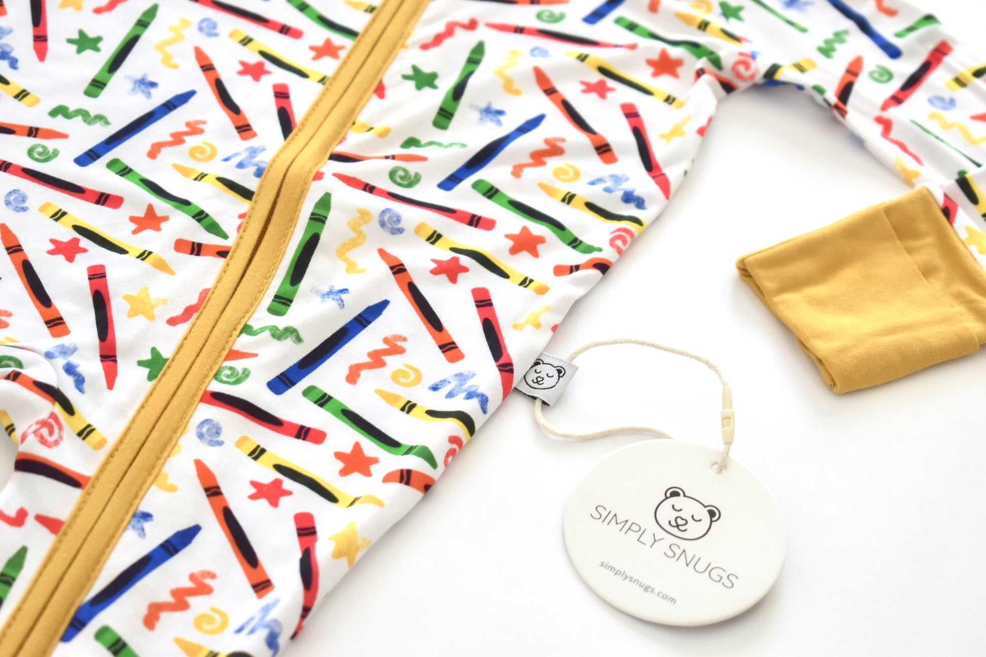 Baby pajama with crayon pattern