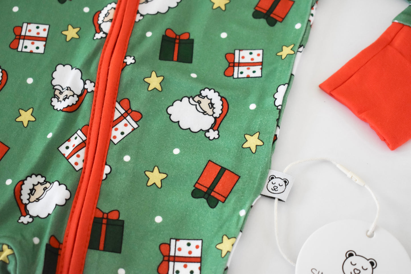 Green and red Christmas presents baby pajamas